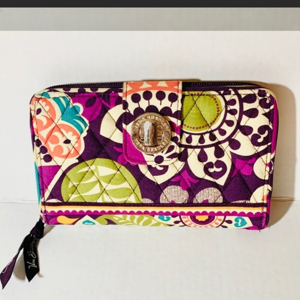 COPY - -Brand Vera Bradley
-Plum Crazy Design
-Zippers all Work Well
-Many Card…